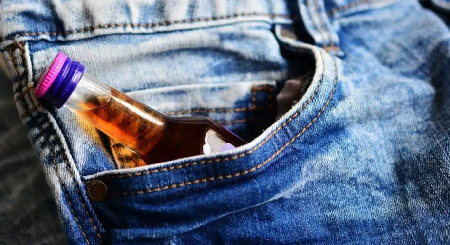 alcohol bottle in your pocket of jeans