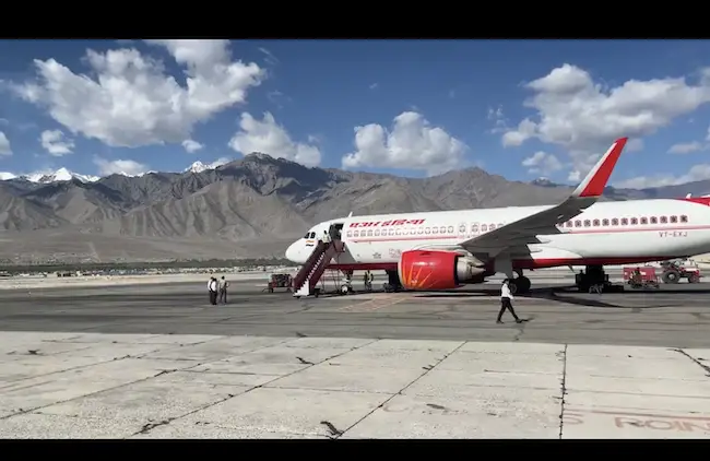ladakh airport with air india flight and mountains beautiful