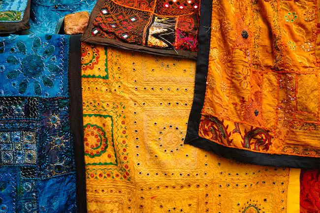 Indian fabric with Indian patterns close up.