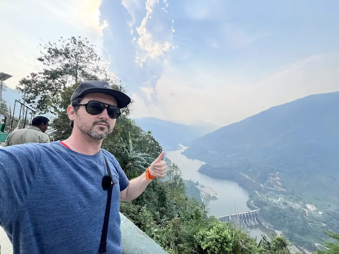 ben jenks standing in front of valley in arunachal pradesh on way to ziro valley